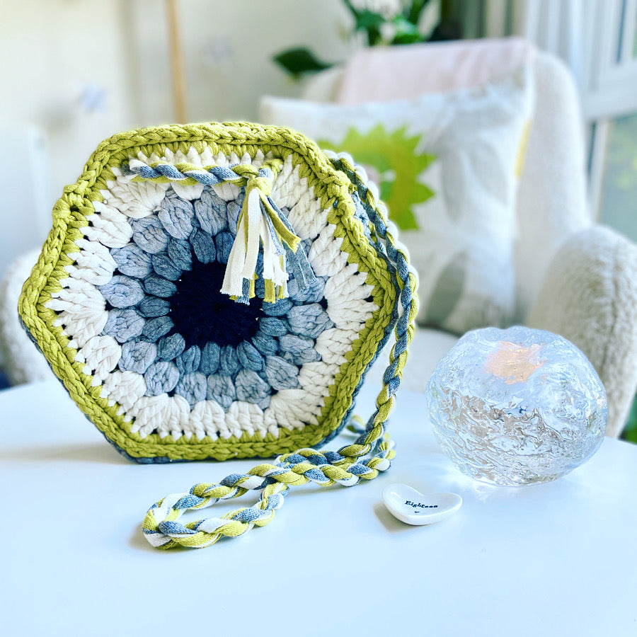 Mid century inspired hexagon granny square bag in recycled yarn