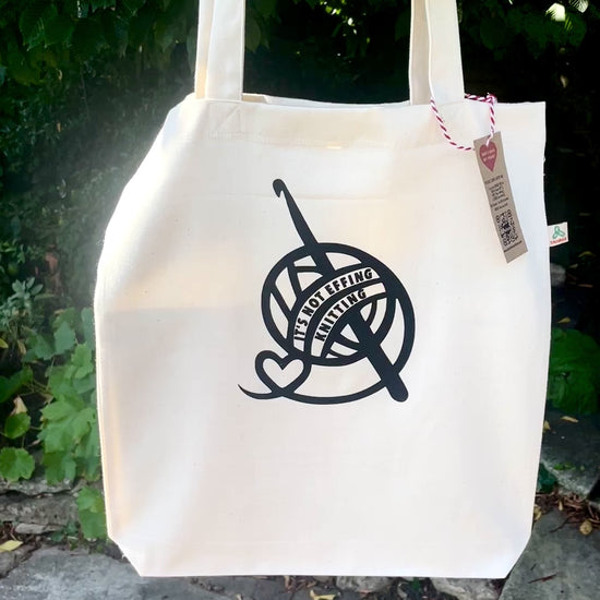 It's not effing knitting Tote Bag swinging in the breeze